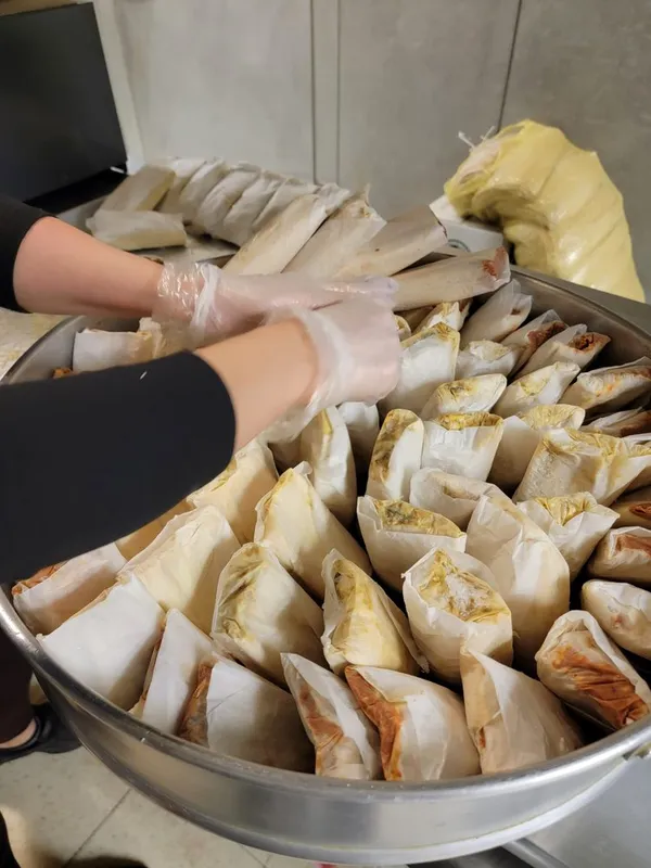 Tamales being prepared in the La Mexicana Bakery kitchen